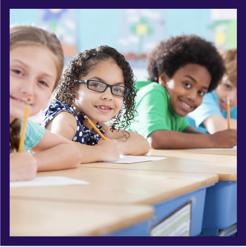 Kids writing in class